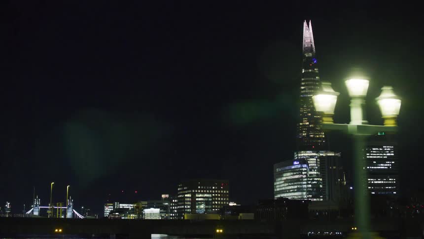 The top of the skyscraper is brightly lit