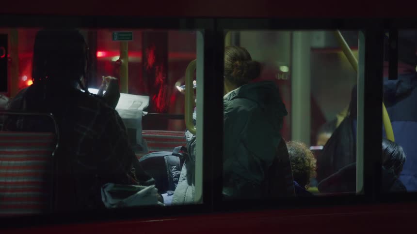 People are riding on the bus