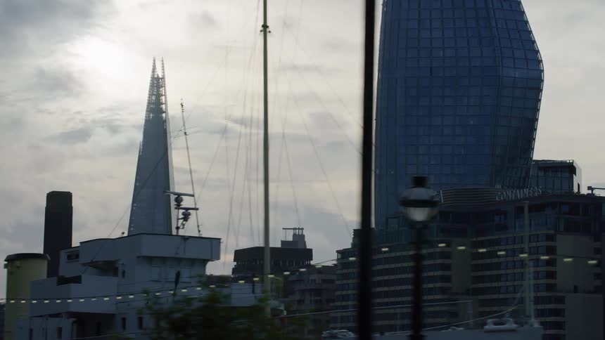 Buildings and trees near the shard london england during the day