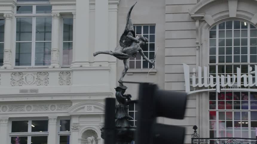 A clip of a statue in a street
