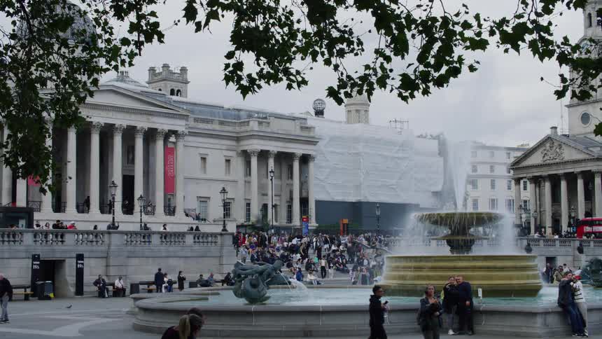 A clip of a fountain in front of a building