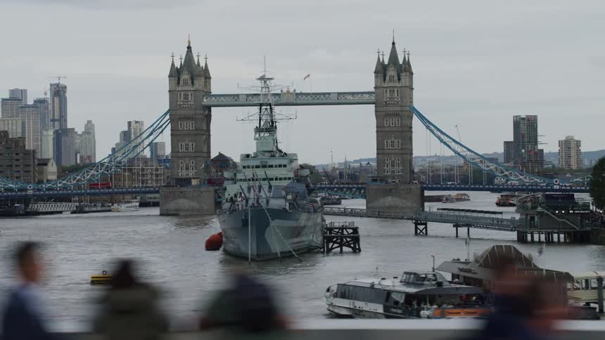 London bridge river and ship pedestrians on walkway