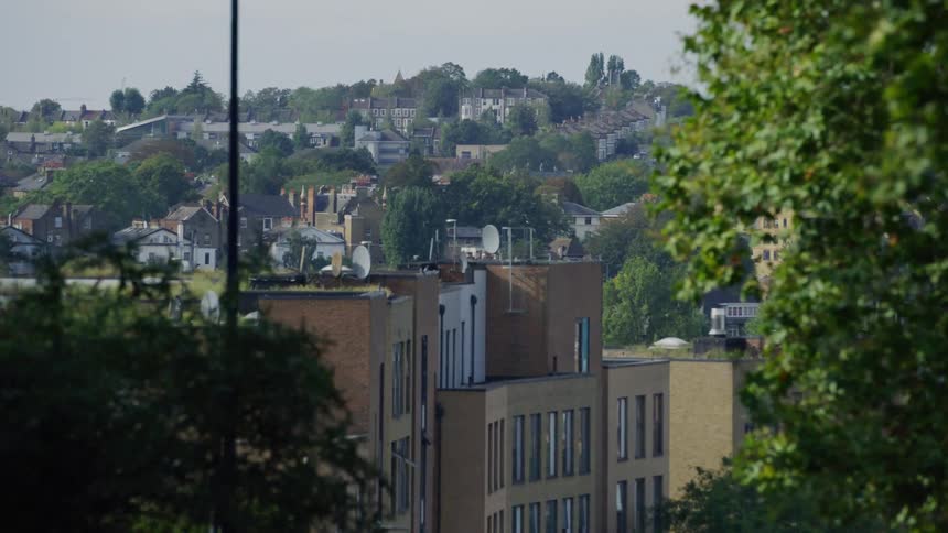 Daytime view of buildings and houses on the hills