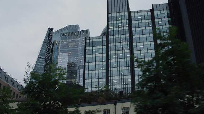 A clip of office buildings and skyscrapers in a city