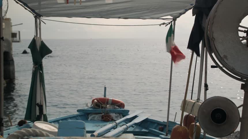 A boat floats on the ocean