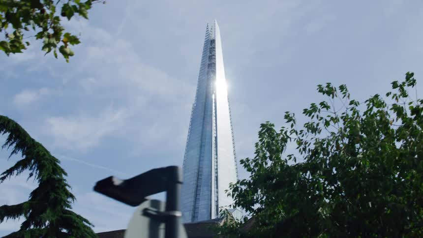View of a metropolitan city highlighting a huge tower with modern architecture