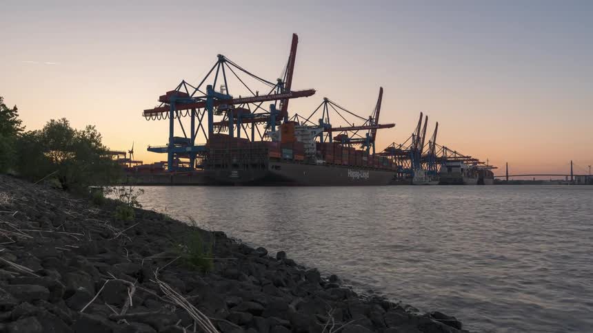 Crane arranging shipping container in a sea port