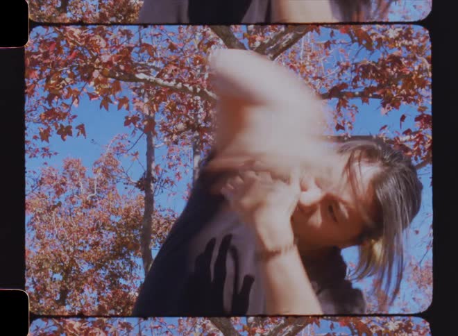 Closeup of a woman gesturing with her arms in a dance