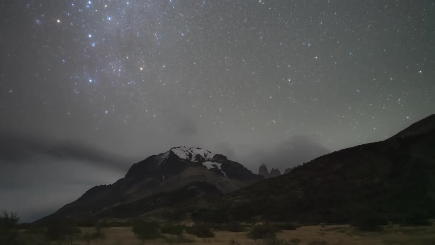 Stars visible above a mountain range
