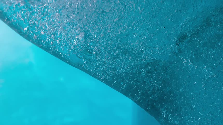 Detailed motion shot of glacier ice