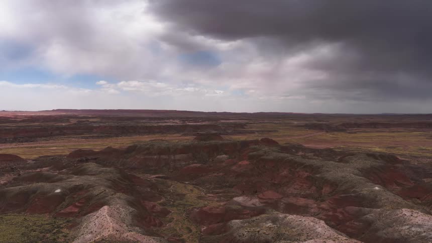 Natural panorama of plateau canyons on a cloudy day with clouds passing by