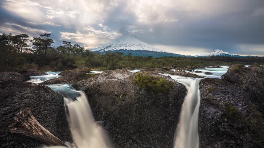 Waterfalls in front of a mountain