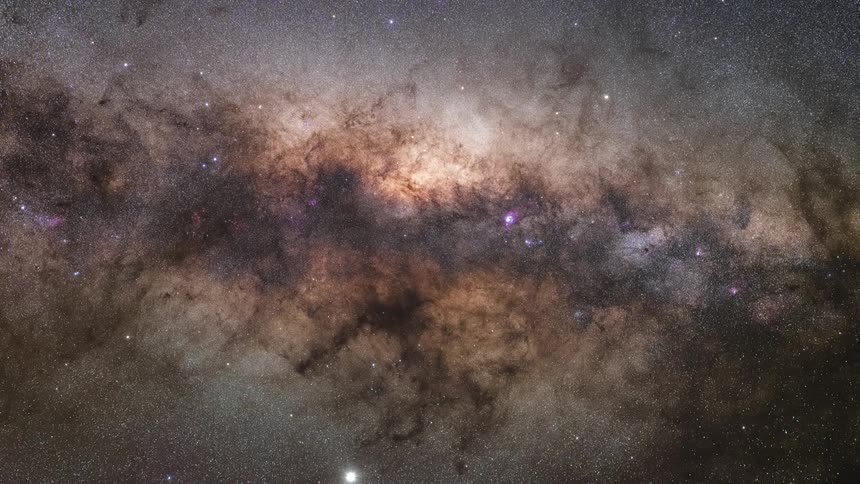 tracking shot of the core of the milkyway galaxy