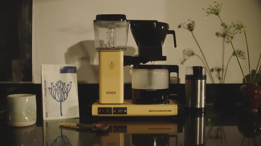 Cofee Maker Brewing A Pot of Coffee on Kitchen Counter