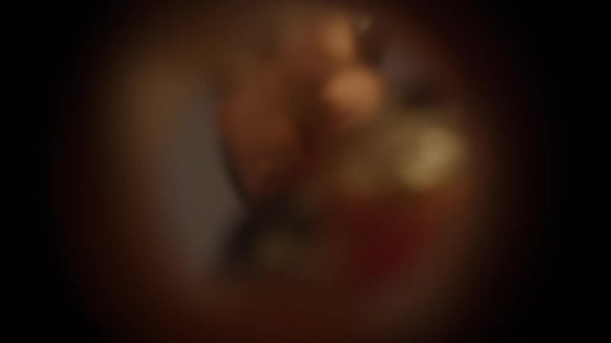 POV of a woman pouring coffee into a mug