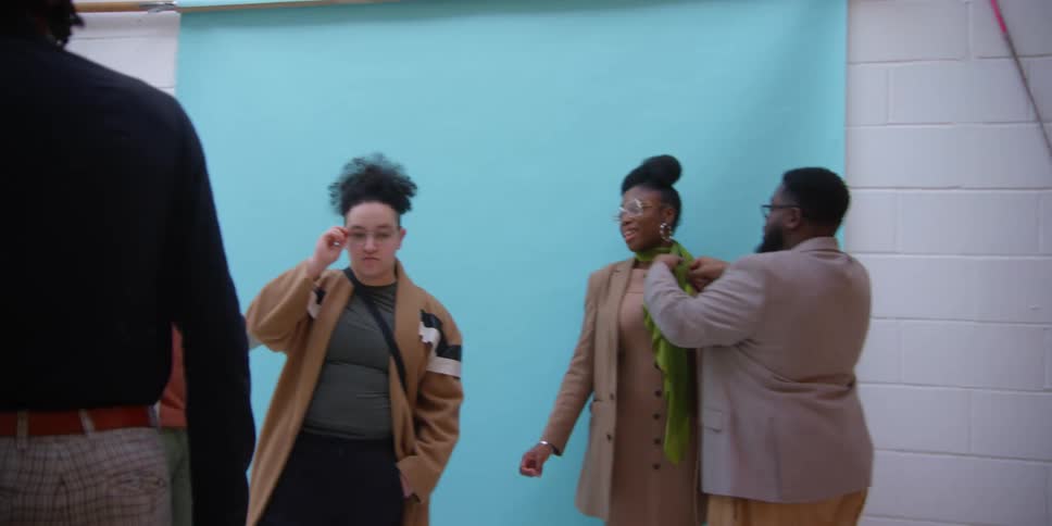 People organizing a fashion photo shoot