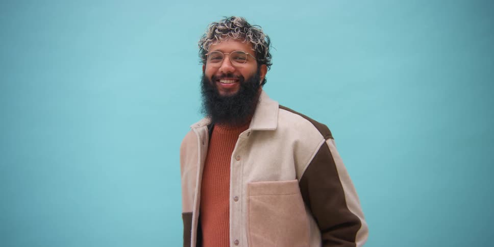 A portrait of a young man smiling