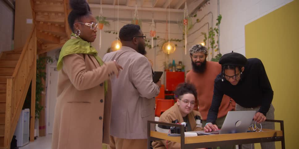 A group of people working together at a photography studio