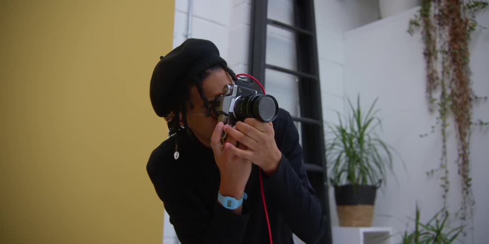 A man taking photos with a professional camera