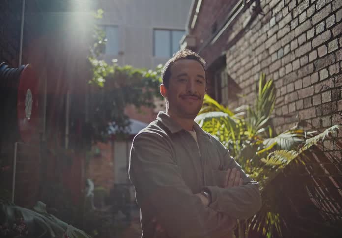 Portrait of a man in the garden giving a smile