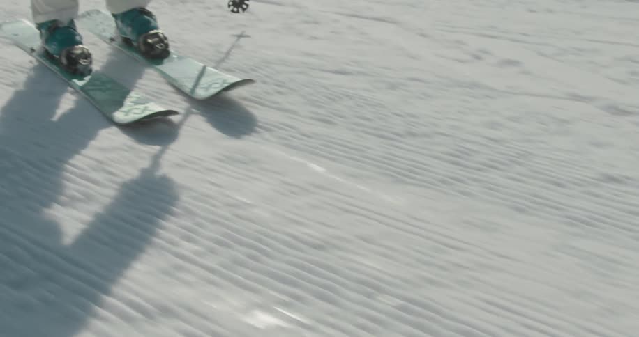 A person skiing on a fresh slope