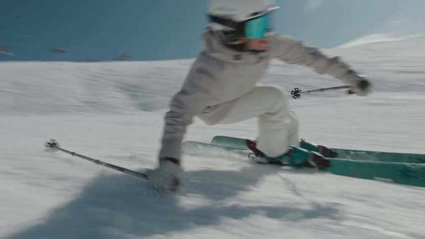 A skier making a turn on a slope