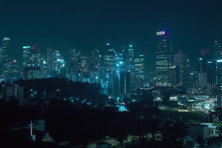 Timelapse of a metropolis with a skyscrapers rising at night