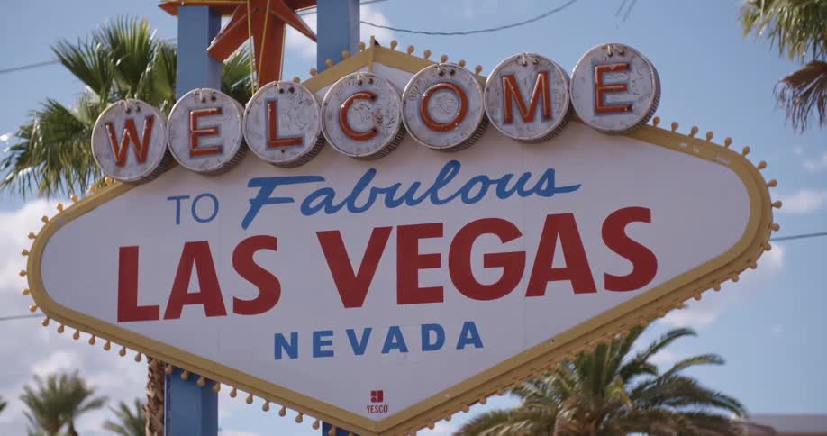 The welcome to las vegas sign on a sunny day