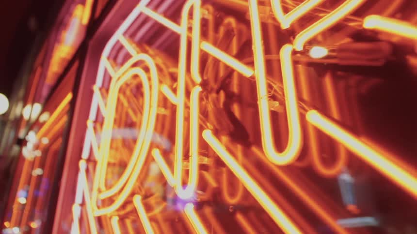 Red and orange neon lights at night