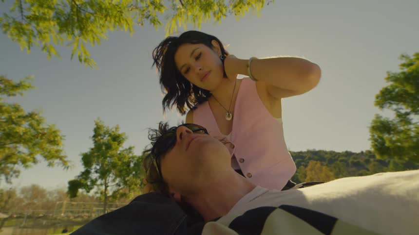 A man and a woman spending time together in a park