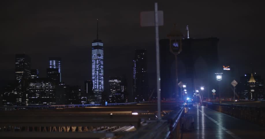 Vehicle light blinks in the city at night