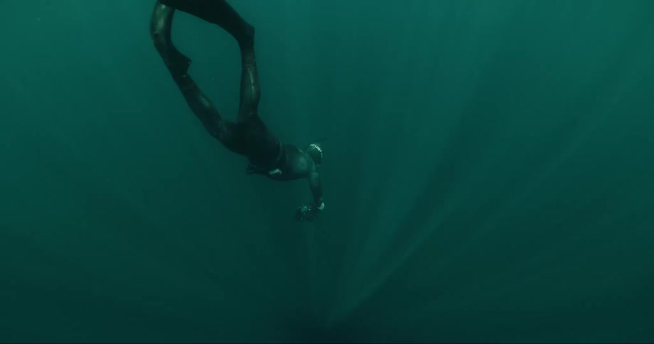 A person is diving underwater