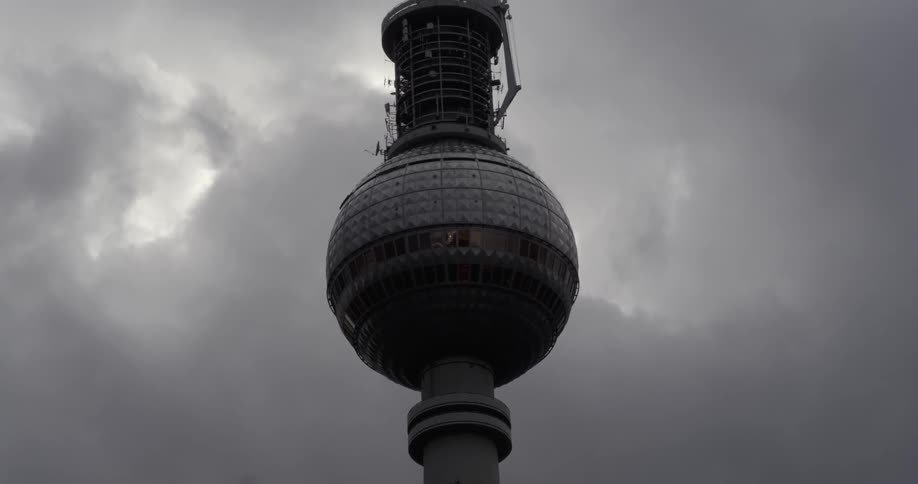A large monument towers into the overcast sky
