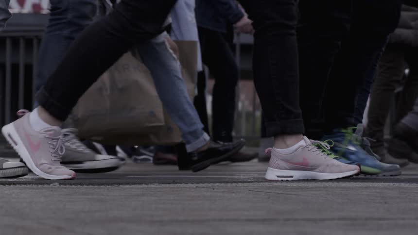 Pedestrians walking on a urban street