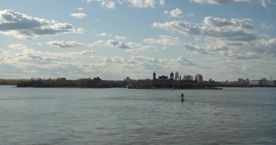 View looking across a body of water at a distant city