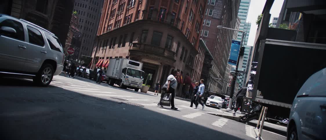 Panorama of a city street with pedestrians and vehicles in a metropolis