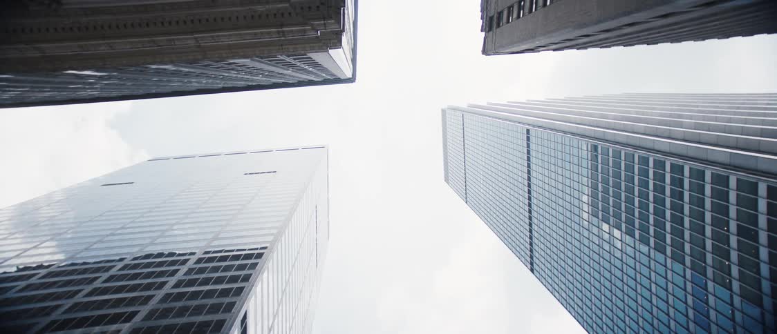 A city skyline with skyscraper buildings