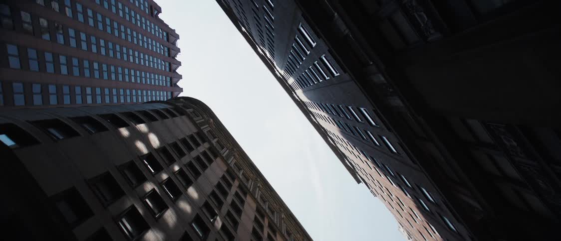 Buildings in a city tower into the sky
