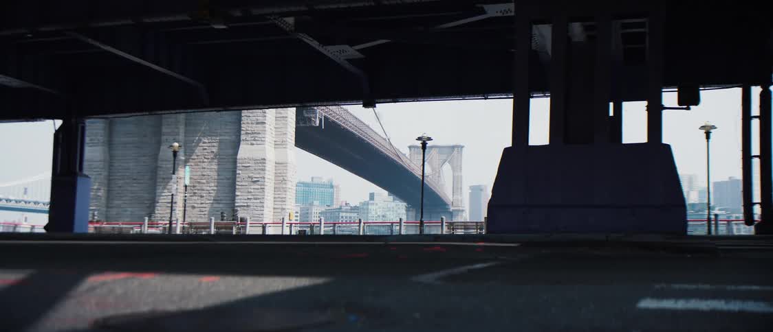 View of a viaduct with a glimpse of a bridge over the sea in a metropolis