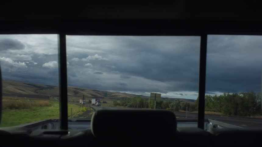 A vehicle moving down a highway