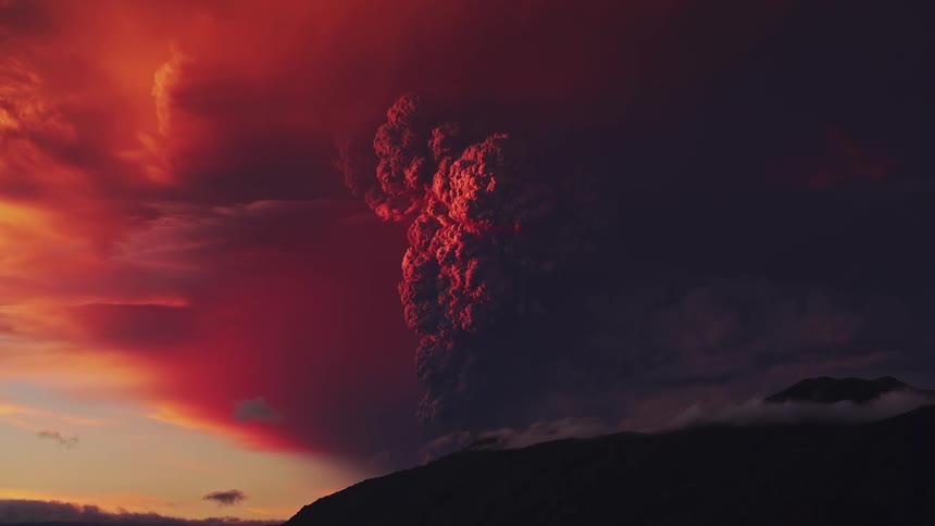 Red clouds dark sky volcanic eruption