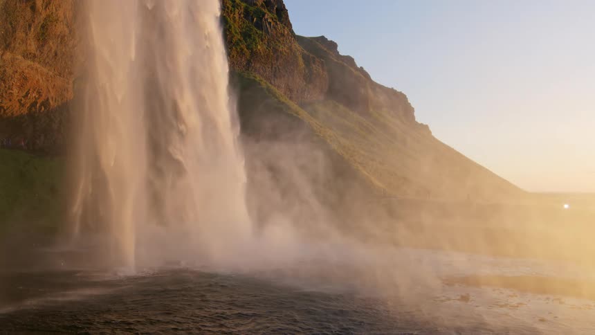 The waterfall is giving of mist
