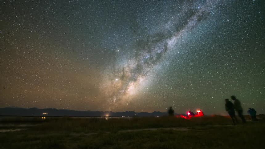 A number of people show up to photograph the milky way galaxy in the night sky