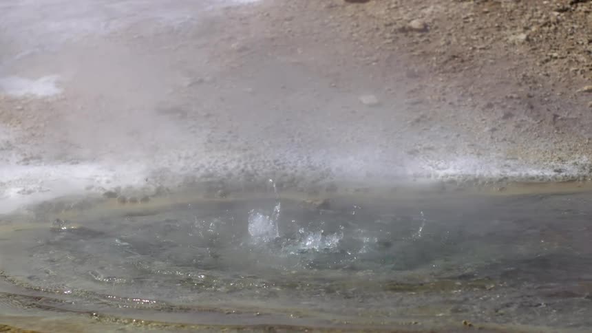 Geyser bubbles and steams