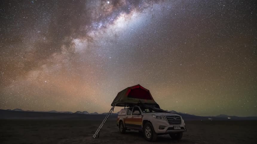 Vehicle on a ground with a top tent and day to night in nebula dawning timelapse