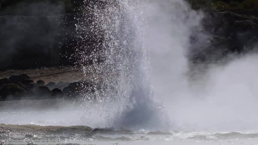 An eruption in the thermal lake during the day