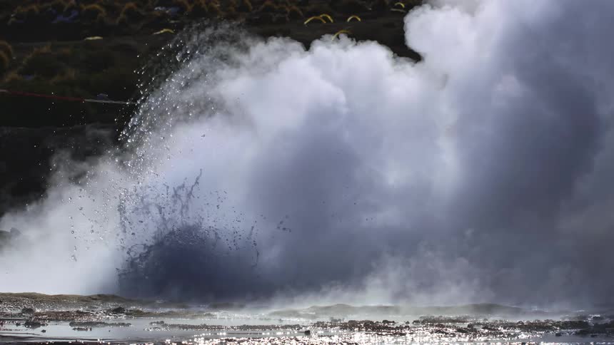 A geyser throws up copious amounts of water and steam