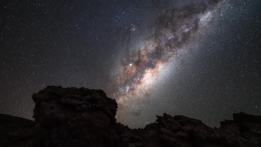 Landscapes of rocky walls with nebula in the sky in timelapse