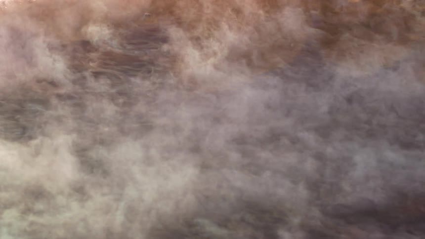 The clouds flow over the ground