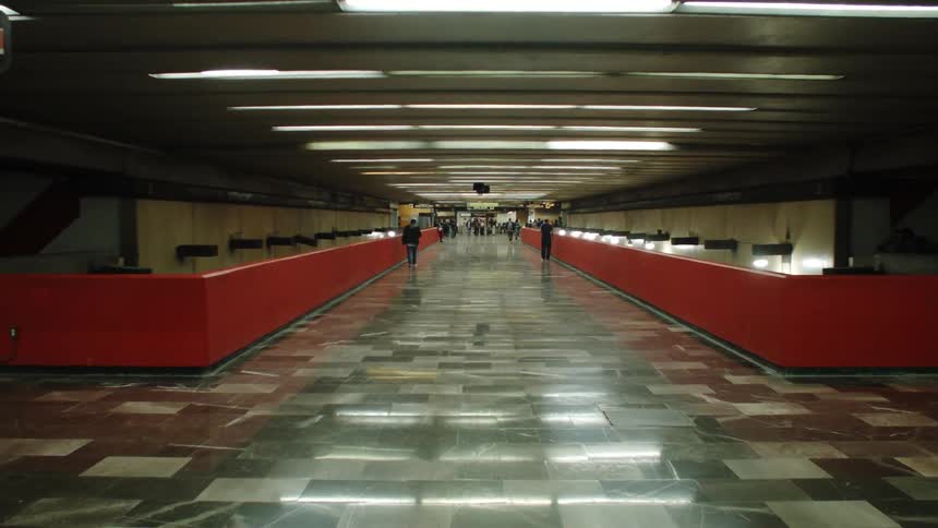 People walking inside a subway station